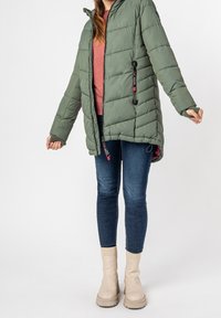 Sublevel Abrigo de invierno - green