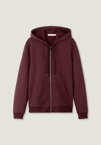 Burgunderfarbene Reißverschluss-Hoodie aus weichem Baumwollgemisch, mit großer Kapuze, Kordelzügen und zwei Fronttaschen. Glatte Textur, lässiges Design.