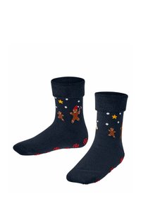 Marineblaue Socken mit einem gerollten Bündchen, die Lebkuchenmänner, Zuckerstangen und Sterne in vielen Farben zeigen, mit einem strukturierten roten Schneeflockenmuster an der Sohle.