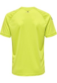 T-shirts med korte ærmer i lys gul. Glat, letvægtsstof med rund hals og raglanærmer. Ingen synlige logoer eller mønstre.