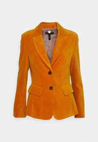 Orange corduroy blazer med spidse lapels, to frontlommer og en enkelt knaplukning. Har en stribet indvendig foring.