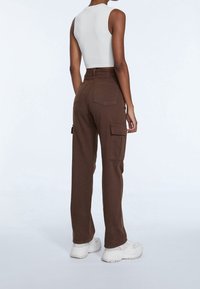 Stradivarius Cargobroek - dark brown