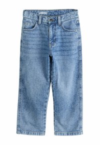 Löysät siniset farkut, joissa on suora lahje, viisi taskua ja metallinappikiinnitys, sekä logolla varustettu vyötärö.