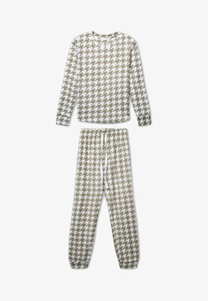Maglia a maniche lunghe e pantaloni con coulisse in un motivo houndstooth beige e bianco, tessuto morbido per abbigliamento da casa o pigiami.