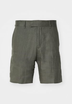 Olive zielone lniane szorty z usztywnioną talią, płaskim przodem i bocznymi kieszeniami. Teksturowana tkanina o luźnym kroju, sięgająca do połowy uda.