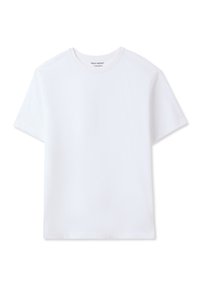 T-shirt bianco a maniche corte realizzato in tessuto di cotone pesante. Presenta un classico colletto a girocura e un design minimale senza ulteriori decorazioni.