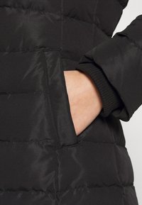 Tommy Jeans Dunkappa / -rock - black