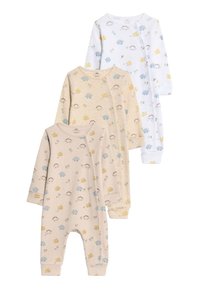 Trois grenouillères à manches longues pour bébé : une blanche avec des motifs de dinosaures colorés, deux beiges avec des motifs similaires en tissu doux et avec une texture côtelée.