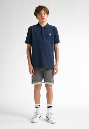 - Koszulka polo