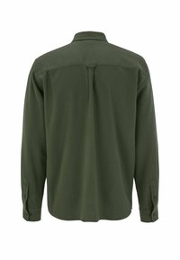 Langarmshirt van donkergroen materiaal, gestructureerd ontwerp met een kraag, achternaaddetails en met knopen sluitende manchetten. Sterke textuur.
