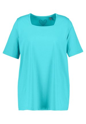 Turkusowa koszulka z krótkim rękawem i kwadratowym dekoltem, z sercowym wzorem wewnątrz kołnierza. Wykonana z miękkiej bawełny.