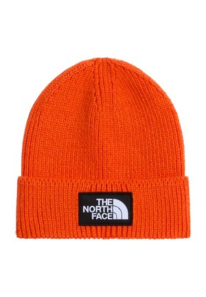 Berretto lavorato a maglia arancione brillante con risvolto, con patch con il logo The North Face in bianco e nero sulla parte anteriore.