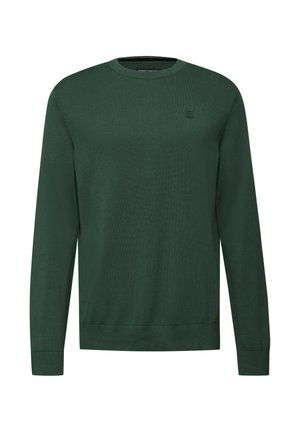 Grøn strikket sweater med rund hals, lange ærmer og en subtil logo detalje på brystet. Glat tekstur og tætsiddende design.