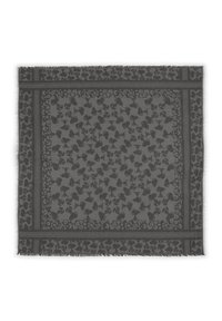 Écharpe grise présentant un motif texturé de formes abstraites et de taches de léopard, bordée d'une frange finement détaillée.