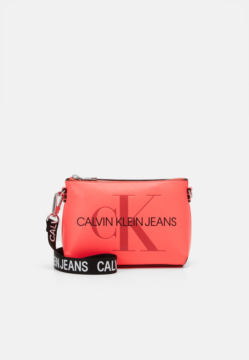 Calvin Klein Jeans CAMERA POUCH Across body bag pink/light pink