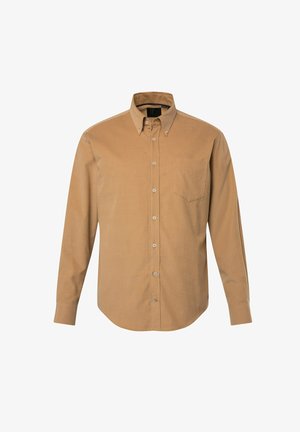 Hellbraune Hemdjacke aus Baumwollstoff, mit einem spitzen Kragen, einer Brusttasche und perlmuttfarbenen Knöpfen, sowie einem abgerundeten Saum.