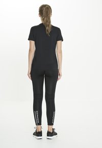 Endurance FUNKTIONS YONAN - T-shirt de sport - 1001 black