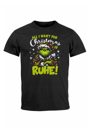 Black t-shirt featuring a graphic of a green character with a serious expression, surrounded by colorful Christmas lights and text saying “All I want for Christmas is RUHE!”
