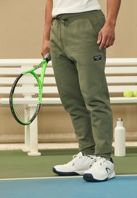 Björn Borg - CENTRE TAPERED PANTS - Teplákové kalhoty - beetle Miniatura obrázku 1