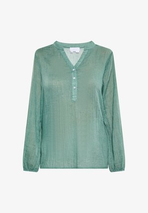 Světle zelená halenka s dlouhými rukávy ve zvrásněné textuře s výstřihem do V a knoflíkovou légou na pět knoflíků. Měkká tkanina s volným střihem.