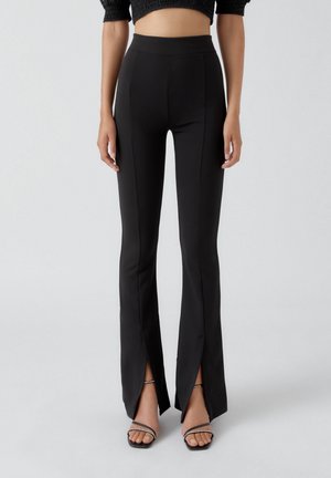 Spodnie materiałowe