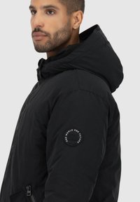 alife & kickin Cappotto invernale - black