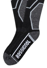 Calcetines hasta la rodilla en negro y gris con un patrón geométrico y el logo "ROSSIGNOL" en blanco en el puño acanalado. Textura suave y ajuste elástico.