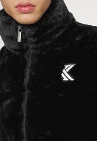 Karl Kani Talvitakki - black