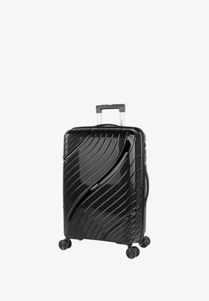 Maleta rígida negra con una superficie texturizada ondulada, cuatro ruedas y un asa retráctil para facilitar su maniobrabilidad.
