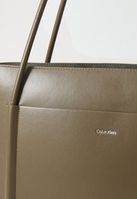 Calvin Klein LARGE SHOPPER - Shopping bag - teak
