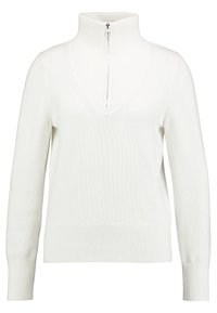 Pull crème avec un col montant à fermeture éclair, un design en V, une texture côtelée et des manches longues.