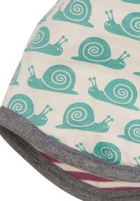 Baumwollstoff mit wiederholenden petrolfarbenen Schnecken auf einem cremfarbenen Hintergrund, einem grauen gestickten Saum und einem kontrastierenden rosa Futter.