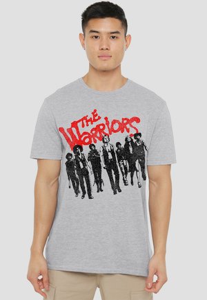 Gray cotton t-shirt featuring a black and red graphic of stylized figures with the text "The Warriors" in bold red lettering.