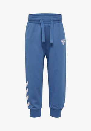 Blaue Baumwoll-Jogginghosen mit elastischem Bund, verstellbarem Kordelzug und weißen Chevron-Akzenten an der Seite. Weicher Stoff, schmal zulaufende Beine.