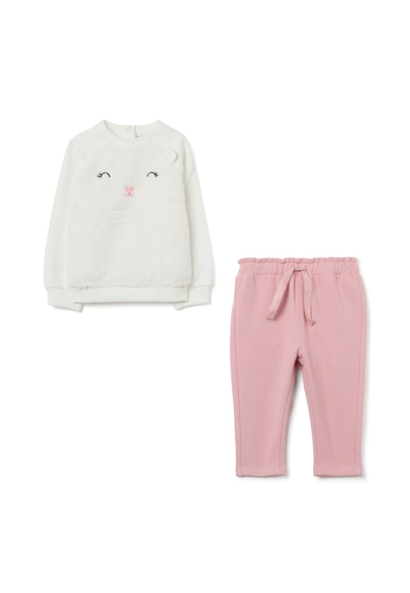 Haut long à manches blanches pour tout-petit avec un devant duveteux et un visage d'ours, associé à un pantalon rose à taille élastique avec cordon de serrage.