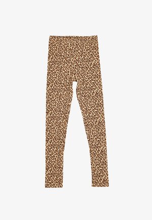 Leggings en imprimé animal beige avec des taches brunes. Fabriqués en tissu extensible, dotés d'une large taille et d'une coupe ajustée.
