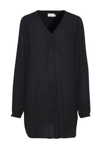 Blouse tunique longue noire à manches longues avec un décolleté en V, présentant un tissu texturé et une coupe droite. Les manches sont légèrement retroussées.