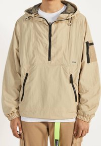 Bershka Outdoorjacka - beige