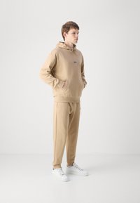 HUGO NALONSO - Sportska majica - medium beige