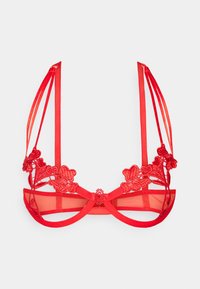 Red bra featuring floral lace detailing, sheer mesh cups, and satin straps. Center bow accent with adjustable straps and hook closure.