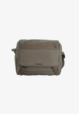 Brown messenger bag made of durable fabric, featuring a fold-over flap, adjustable strap, and an embossed logo on the front.