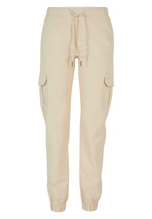 Pantaloni cargo beige con cintura elastica, chiusura con cordino e due tasche laterali. Tessuto liscio con polsini elasticizzati alle caviglie.