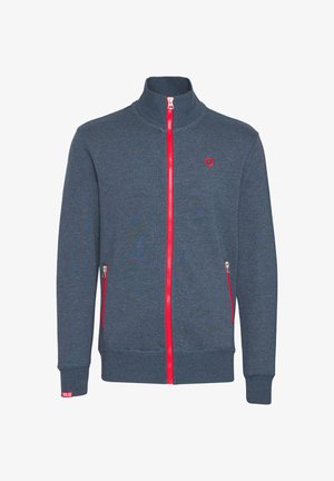Dark blue zip-up jacket with a high collar, red zipper, and two zippered side pockets. Ribbed cuffs and hem with a small logo on the chest.