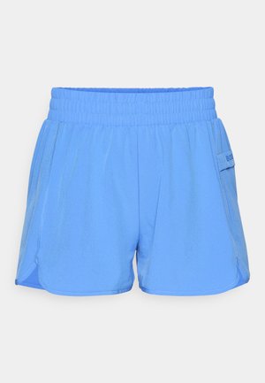 Light blue athletic shorts with an elastic waistband, side pockets, and contrasting stitch detailing. Smooth texture with a relaxed fit.