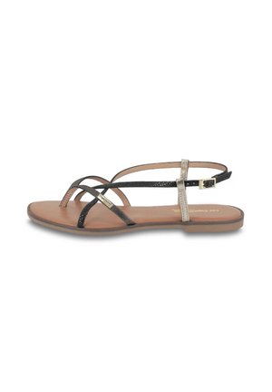Sandali piatti con cinturini neri e metallici, dotati di una morbida soletta color beige e un discreto design a cinturini incrociati; dettaglio con fibbia regolabile.