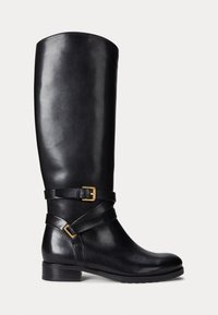 Black leather knee-high boot with a rounded toe, a low block heel, and double straps featuring a gold buckle accent. Smooth texture.