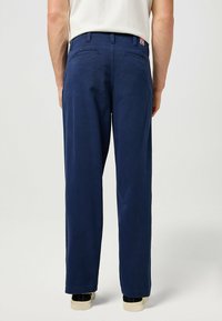 Wrangler - Chinosy