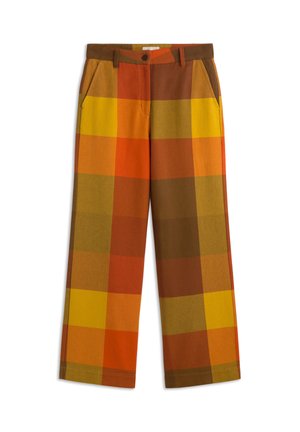 Rutiga byxor med ett schackmönster i orange, gult, brunt och gröna nyanser, tillverkade av ett strukturerat vävt material med sidofickor.