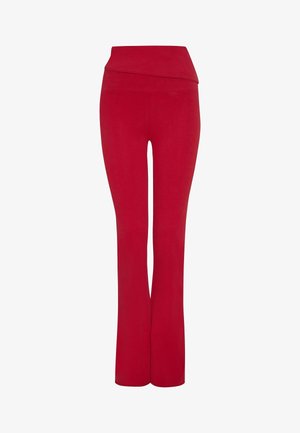 Pantaloni a zampa d'elefante rossi realizzati in materiale elasticizzato, con una vita alta e piegata per un comfort aggiuntivo. Tessuto liscio, vestibilità su misura e design a lunghezza completa.