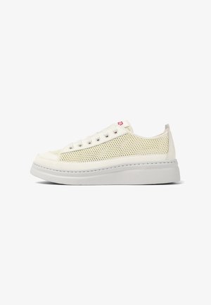 White sneaker with mesh sides, white rubber sole, and laces. Features subtle stitching and logo detail near the heel.